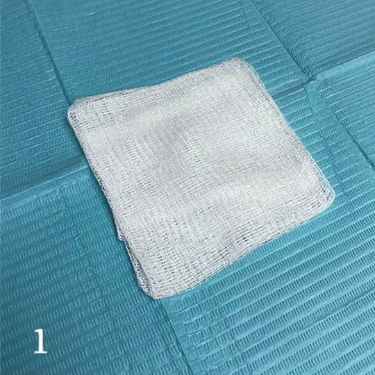 Begin with a 4 x 4-inch piece of gauze.