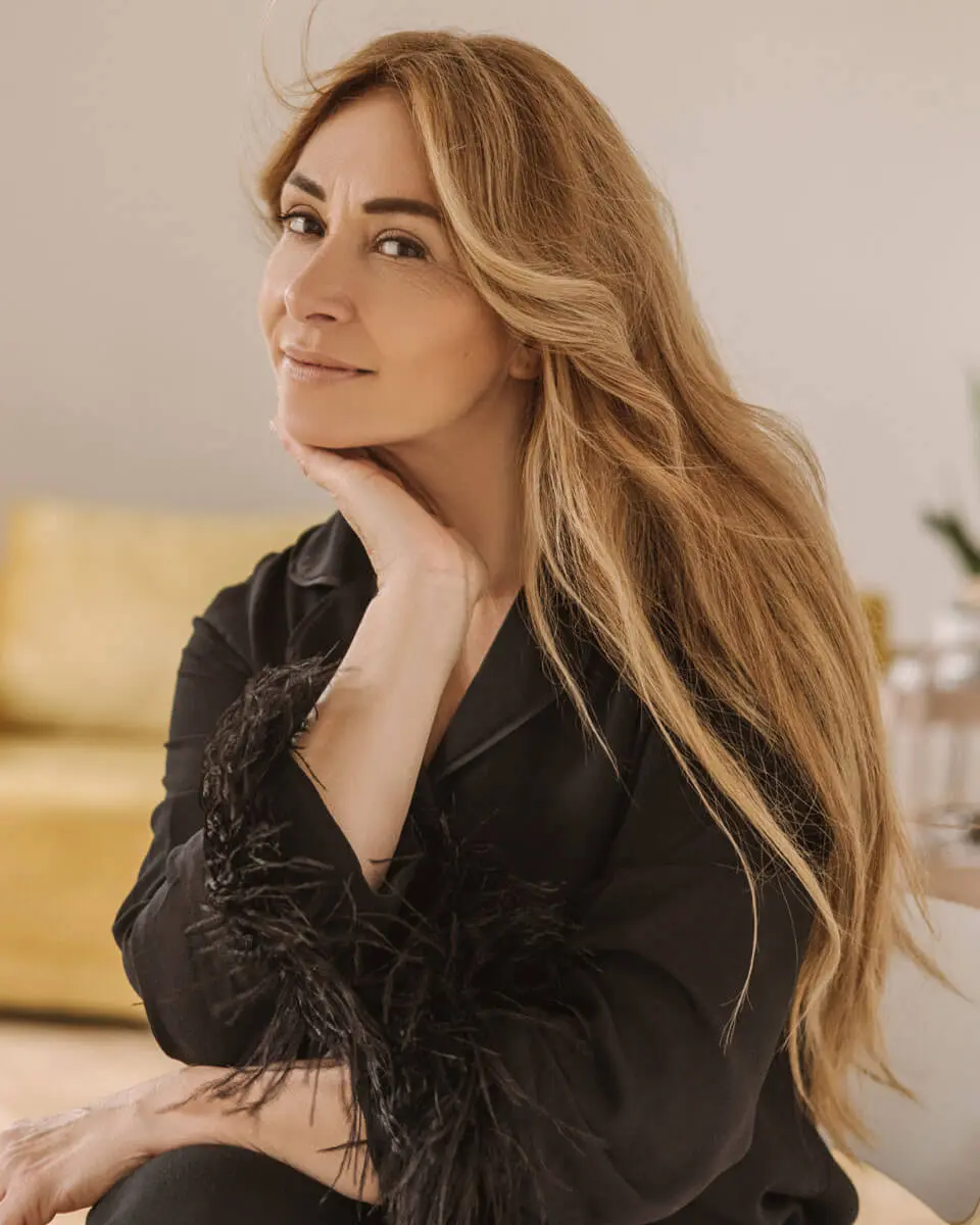 Beautiful blond woman in a black shirt