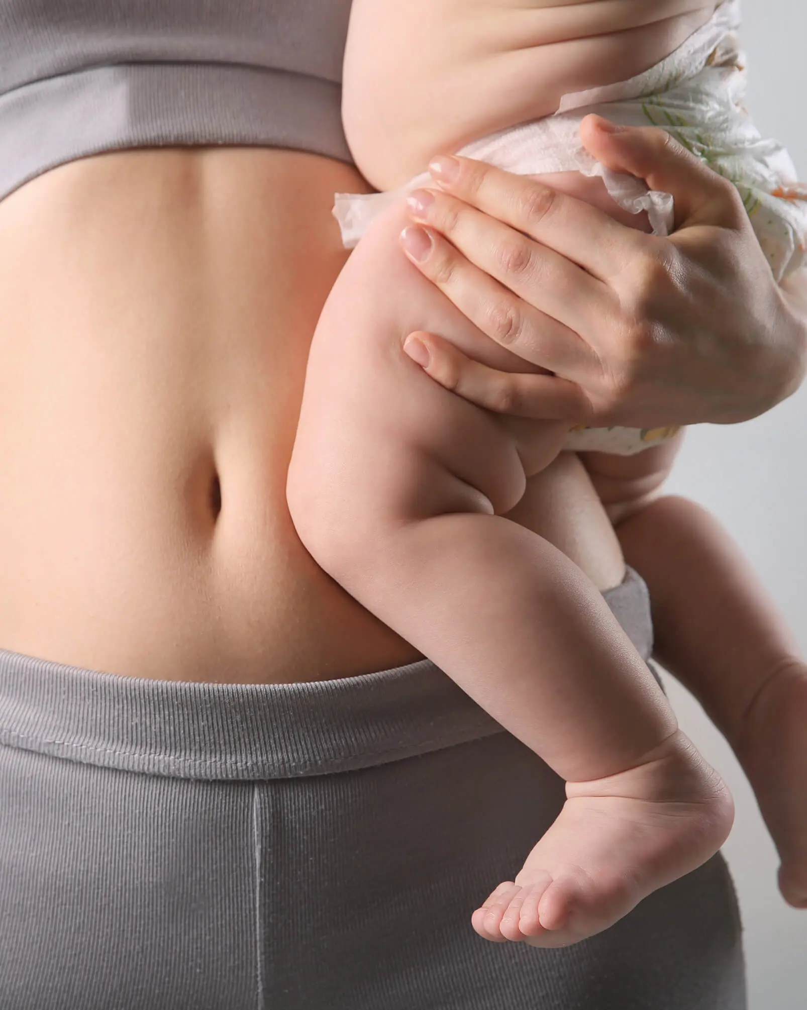 Woman holding a baby in her arms