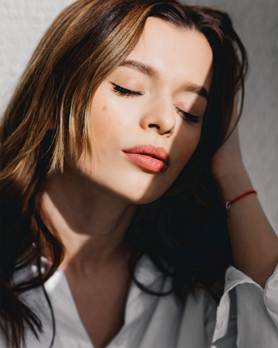 Model Touching her hair