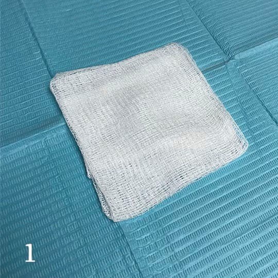 Begin with a 4 x 4-inch piece of gauze.

